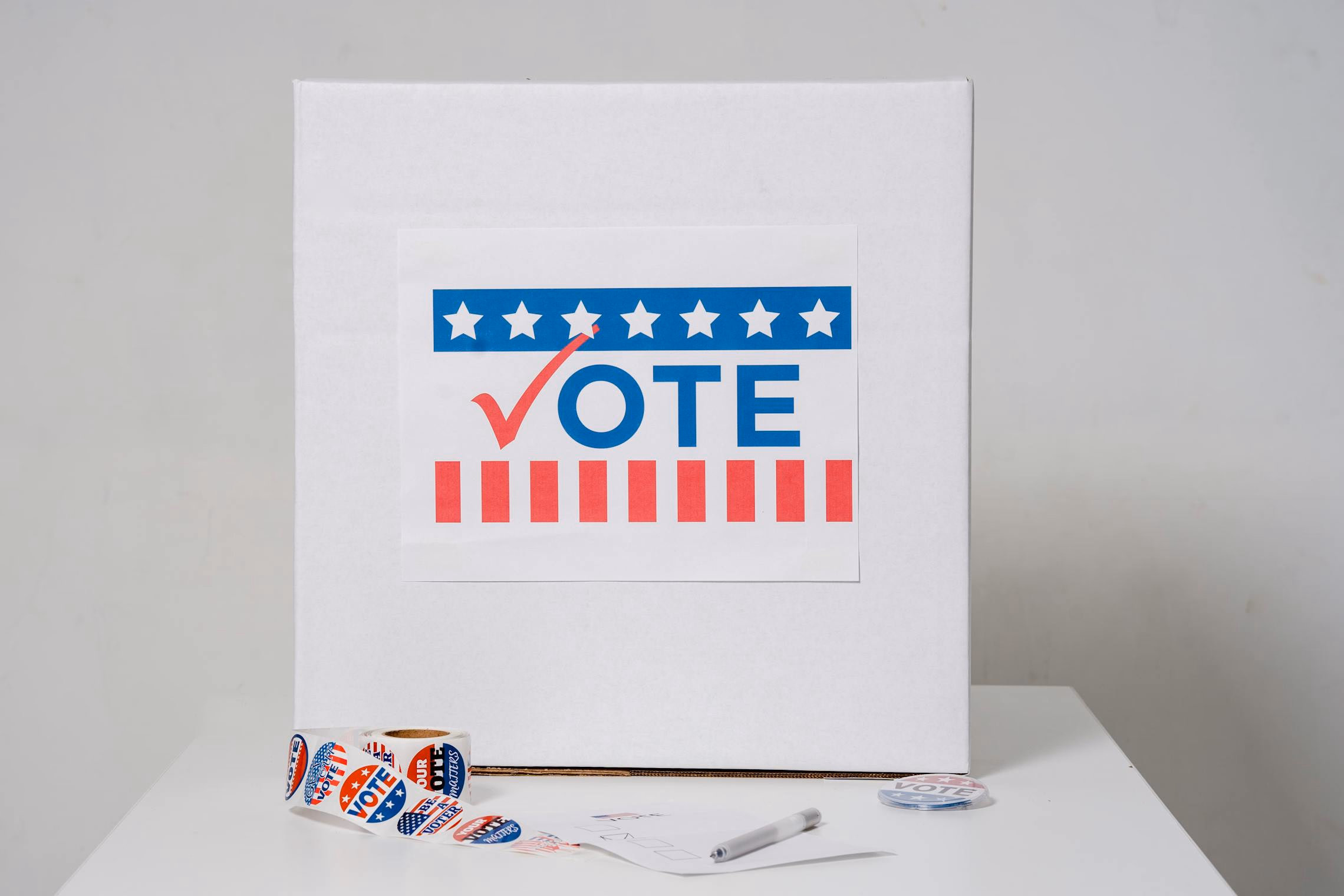 Stack of gothic-styled costume contest voting ballots on a dark table