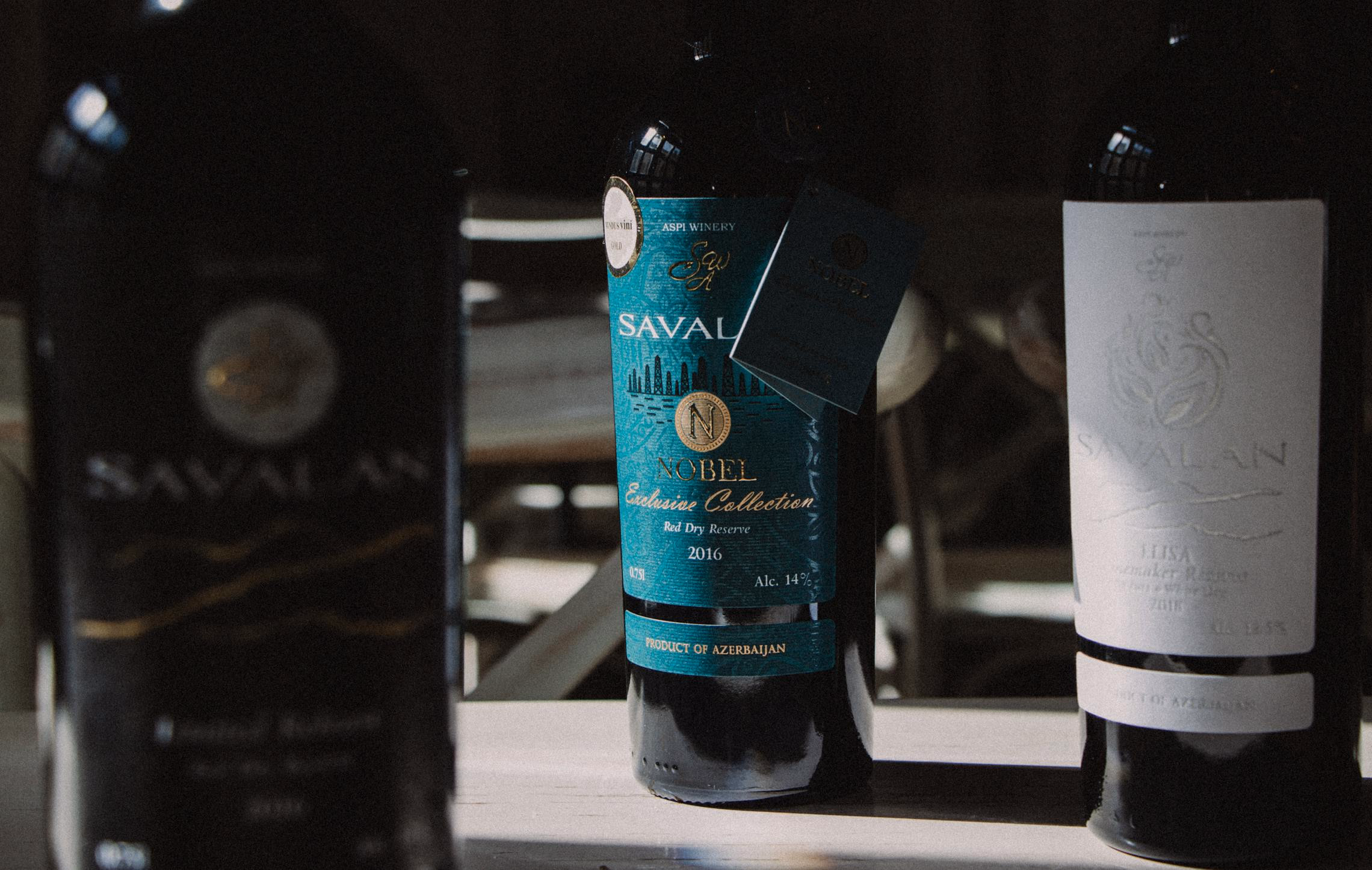 Four gothic wine bottle labels with Dark Manor branding and vintage illustrations